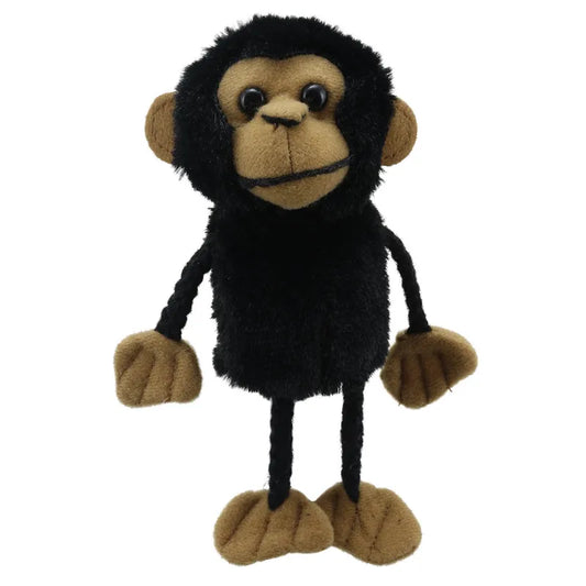 The Puppet Company Chimp Finger Puppet is a plush toy monkey with a dark body and light brown face, ears, hands, and feet. It has large round eyes and a small smile, making it perfect for creative play. Its loosely hanging arms and legs make it ideal for storytelling adventures.