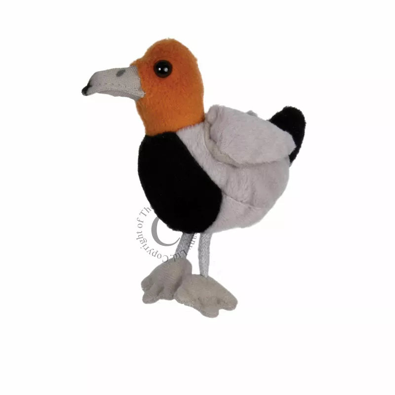 A stuffed puppet with black and white feathers perfect for kids' puppet shows.