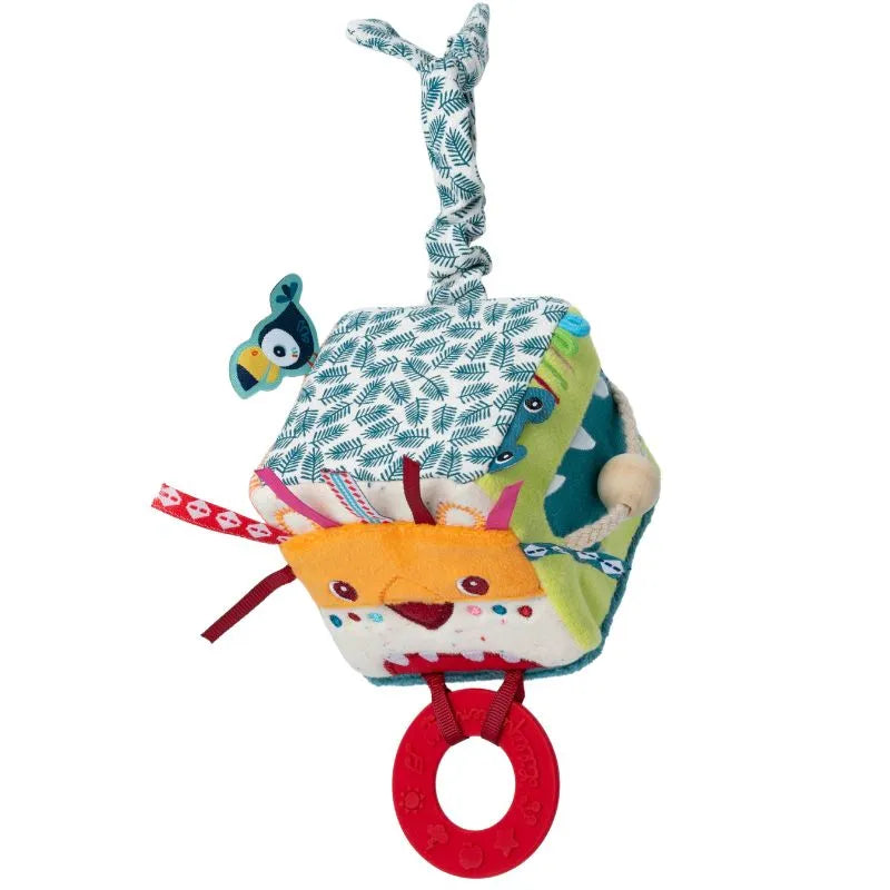 The Lilliputiens I'm Discovering Jack Activity Cube features playful, colorful designs like a lion face, patterns, and a bird. It includes a red teething ring to soothe gums and has a loop handle for easy hanging, making it perfect for engaging little ones during their developmental stages.