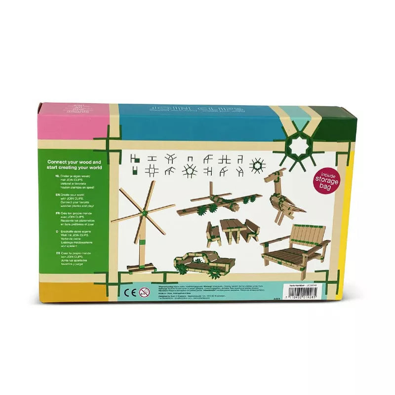 The image displays the back of the Join Clips Construction Home Edition 200 box, featuring illustrations of wooden structures like a windmill and vehicle. The connection clips add versatility, and there are instructions, safety symbols, and STEM skill development hints visible.
