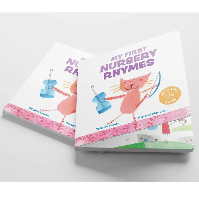 Two copies of "My First Nursery Rhymes" are stacked. The cover features a smiling orange cat playing a blue violin, introducing early language skills with classic English nursery rhymes. The authors’ names appear at the bottom.