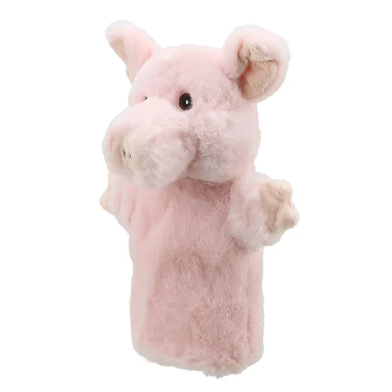 The ECO Puppet Buddies Pig Hand Puppet is a delightful plush pig hand puppet featuring a pink pig with light beige inner ears and a snout. It stands upright with its front paws slightly raised, highlighting its soft and fuzzy texture. This charming farm animal toy has black eyes and a lightly colored mouth.