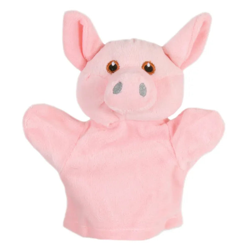Introducing The Puppet Company My First Puppet Pig, a plush pink pig puppet designed for interactive play. It boasts floppy ears, a stubby snout, embroidered eyes and nostrils, and has outstretched arms ready for fun adventures.