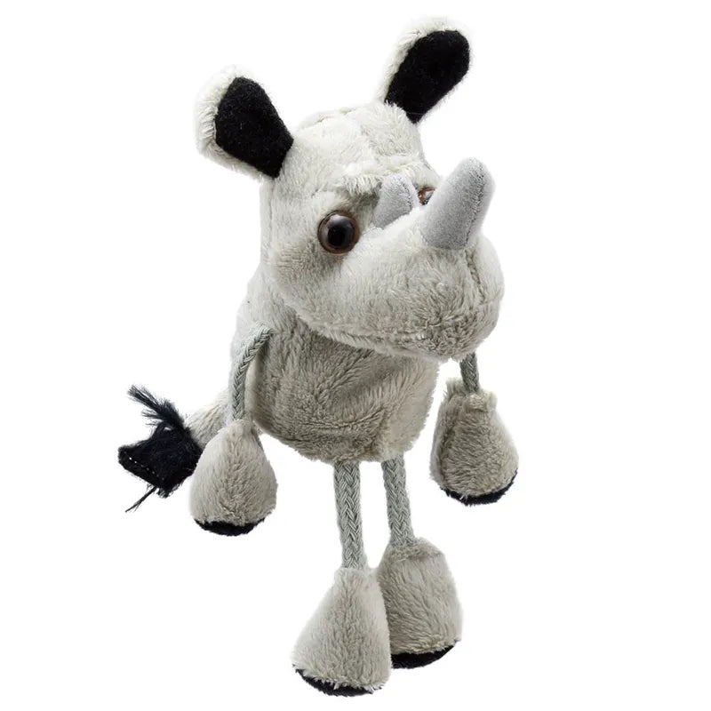 The Puppet Company Rhino Finger Puppet is a plush, cartoon-like toy featuring black ears, feet, and tail. Designed for creative play, it stands upright with large round eyes and a soft grey fabric horn. Its exaggerated legs add whimsy to imaginative storytelling adventures.