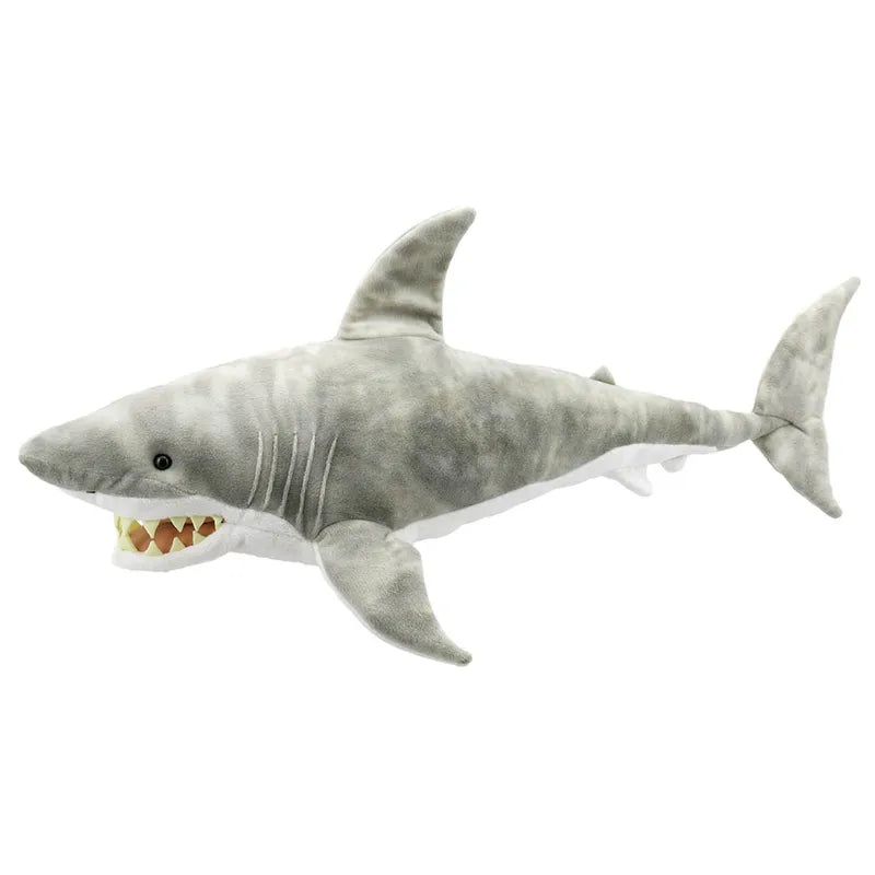 The Puppet Company Large Creature Shark is a realistic plush toy with a gray top and white underside. It features dorsal, pectoral, and tail fins. Its open mouth reveals white and yellow teeth, making it perfect for creative play and inspiring imagination in the wonders of the natural world.