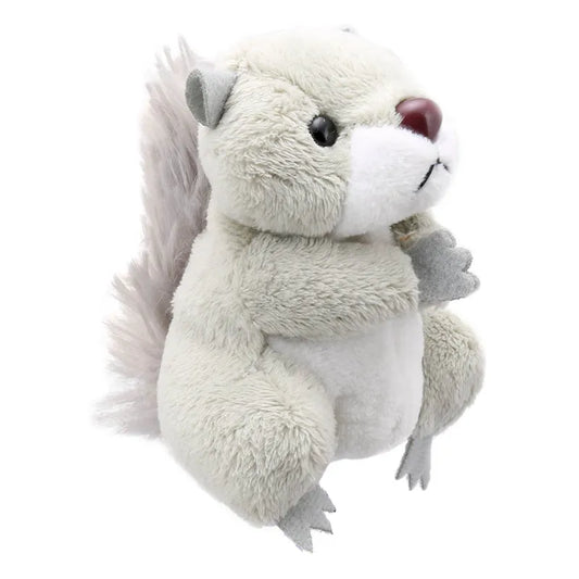 The Puppet Company's Grey Squirrel Finger Puppet is a plush toy resembling a light gray squirrel with a white belly and fluffy tail, featuring black eyes and a maroon nose. It stands upright, ideal for creative play.