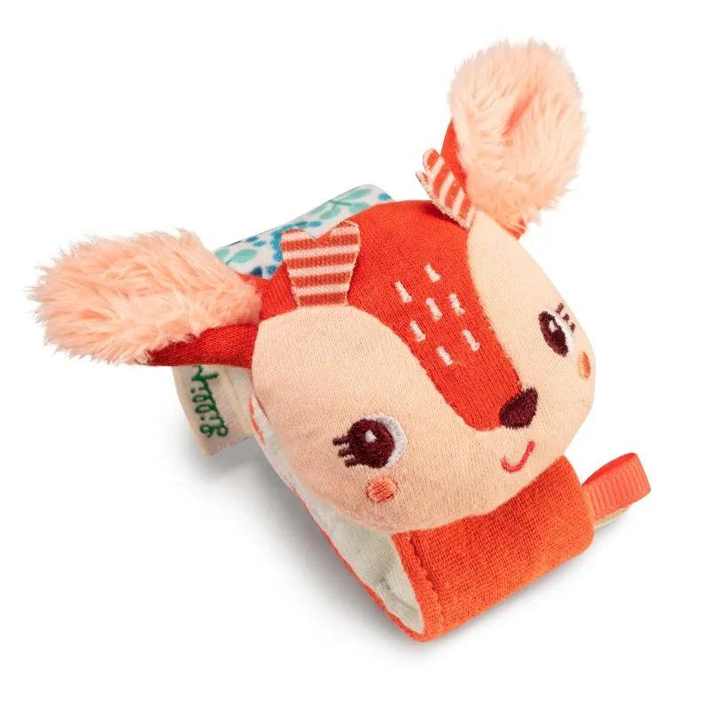 Consider gifting the Lilliputiens I'm Discovering Stella Bracelet Rattle as a delightful birth present. This plush baby toy features an adorable orange and cream deer with embroidered eyes, a smile, pink cheeks, fluffy pink ears, and a teal strap with Velcro for easy attachment.