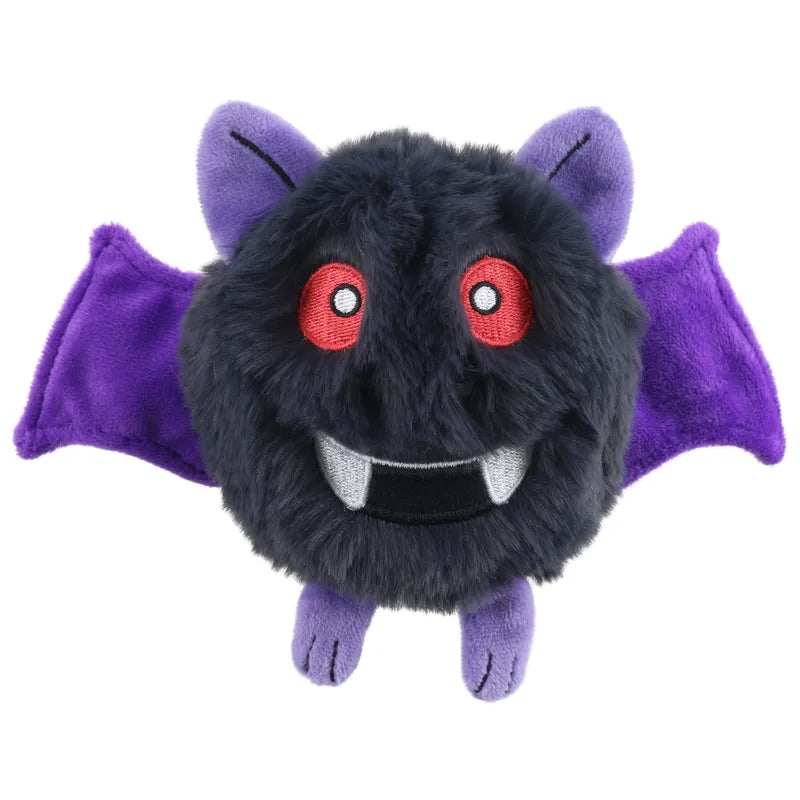 Meet Swoop, the Micro Monster Finger Puppet by The Puppet Company—a round, fluffy black plush with purple bat wings, pointed ears, small purple legs, red eyes, a wide grin, and two soft white fangs. Your perfect cuddly companion!.