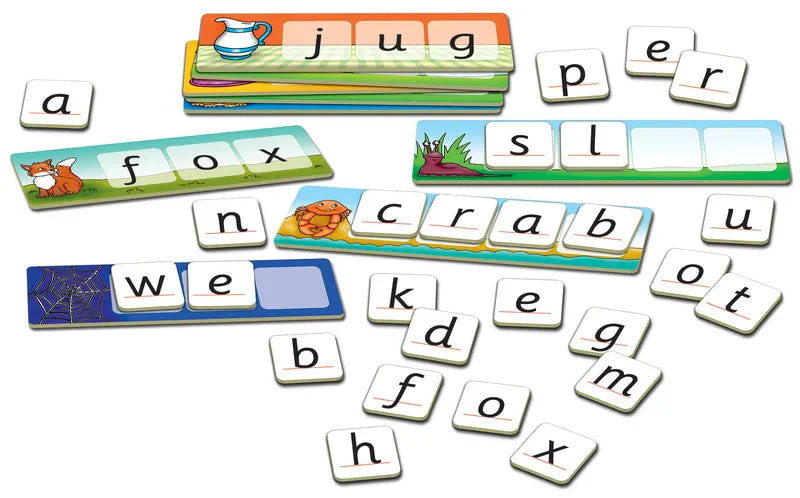 Introducing the Orchard Toys Match And Spell set, featuring word-building cards with images such as a jug, crab, fox, and spider web. Small letter tiles are included and can be used to complete words on the cards like "jug" and "fox.