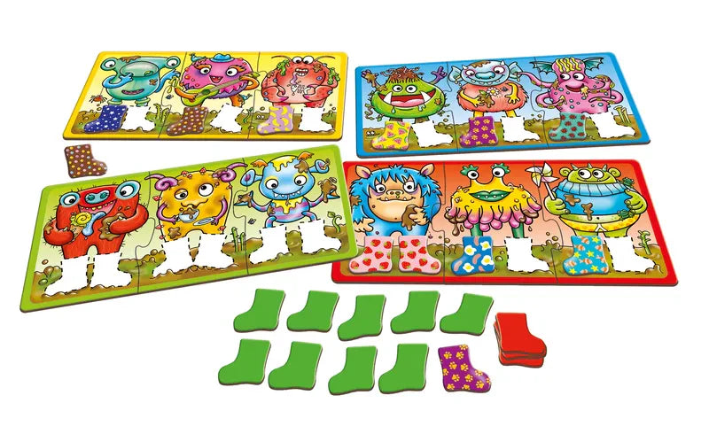 Orchard Toys Smelly Wellies is a whimsical and fun puzzle game where players help colorful monster characters find their missing socks. With four puzzle boards showcasing different playful monsters, you must match the scattered green or red sock pieces in front of them.