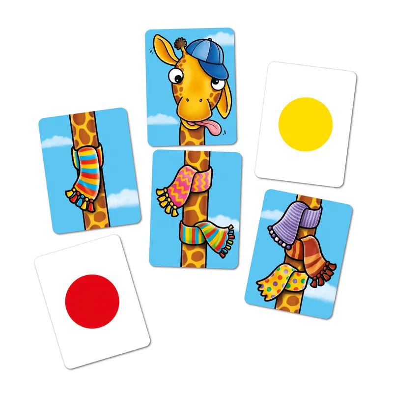 Displayed is the Orchard Toys Giraffes In Scarves collection, consisting of six cards: three cards showcase a whimsical giraffe each wearing unique colorful scarves, two cards display colored circles—a yellow one and a red one—against a white background, and one card depicts a giraffe's head adorned with a blue hat.