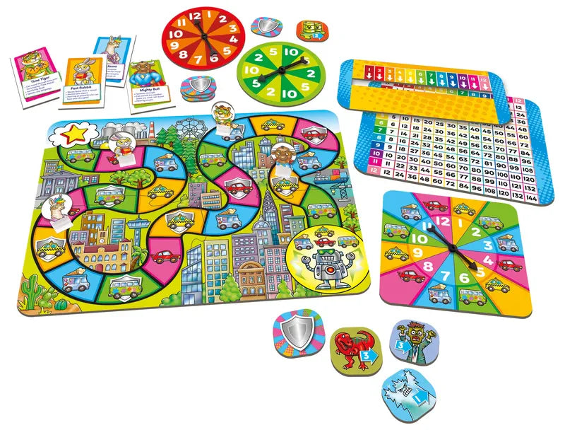 Introducing "Orchard Toys Times Tables Heroes," an engaging educational board game featuring a vibrant city-themed path with number charts, cards, spinners, and various character tokens. The board is adorned with playful illustrations of cars and buildings.