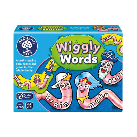 The image depicts the Orchard Toys Wiggly Words, a word game suitable for ages 6 and up. The vibrant box showcases cartoon worms sporting a variety of hats and glasses, with words such as "brain," "make," and "strip" displayed on their bodies.