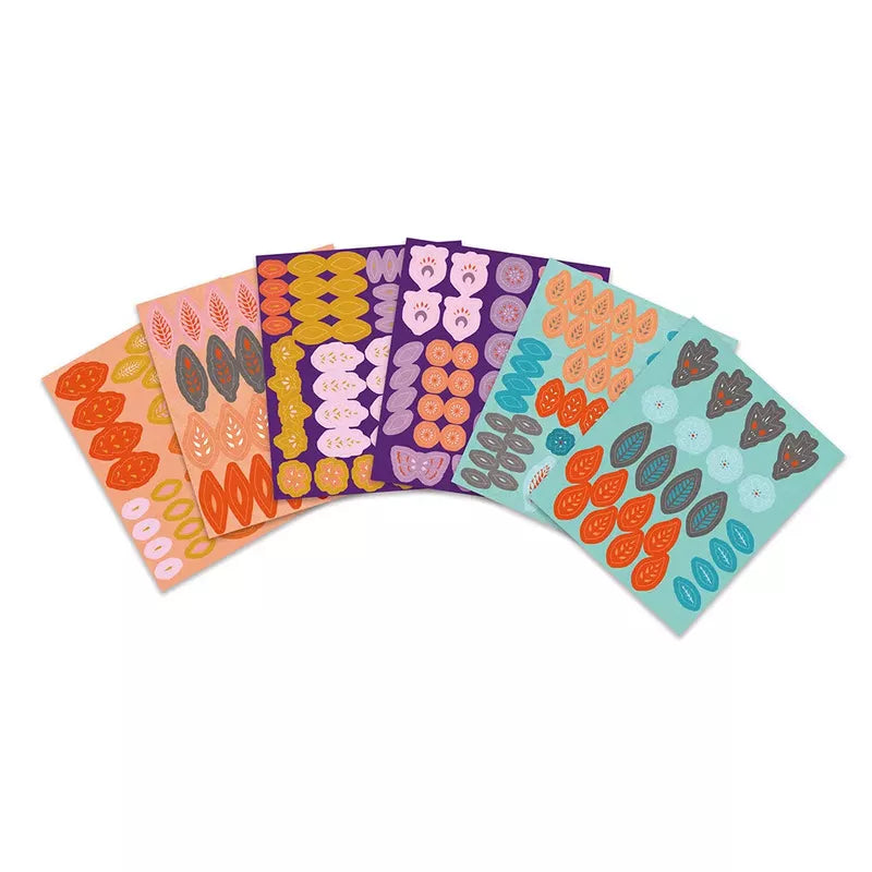 A colorful array of Janod 3 Nature Mandalas fanned out on a white background as part of a creative kit.