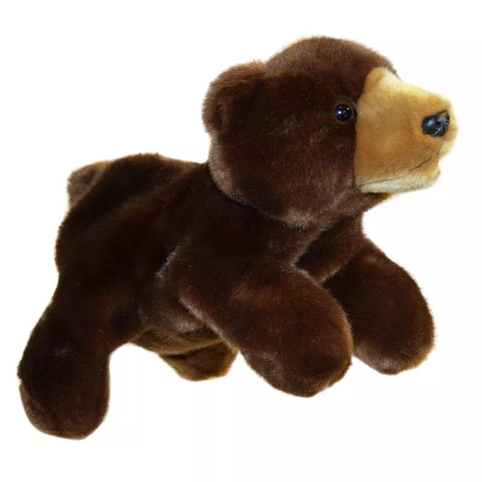 The Puppet Company Full-bodied Hand Puppet Bear is flying in the air.