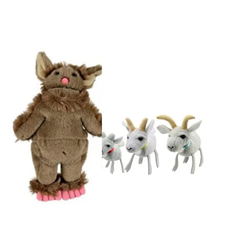 A plush toy resembling a brown creature with large ears, fluffy fur, and pink feet stands on the left. To the right, there are three small white plush goats with golden horns and cute expressions from The Puppet Company 3 Billy Goats Gruff Finger Puppets set, perfect for traditional storytelling on child and adult hands. All toys are set against a plain white background.