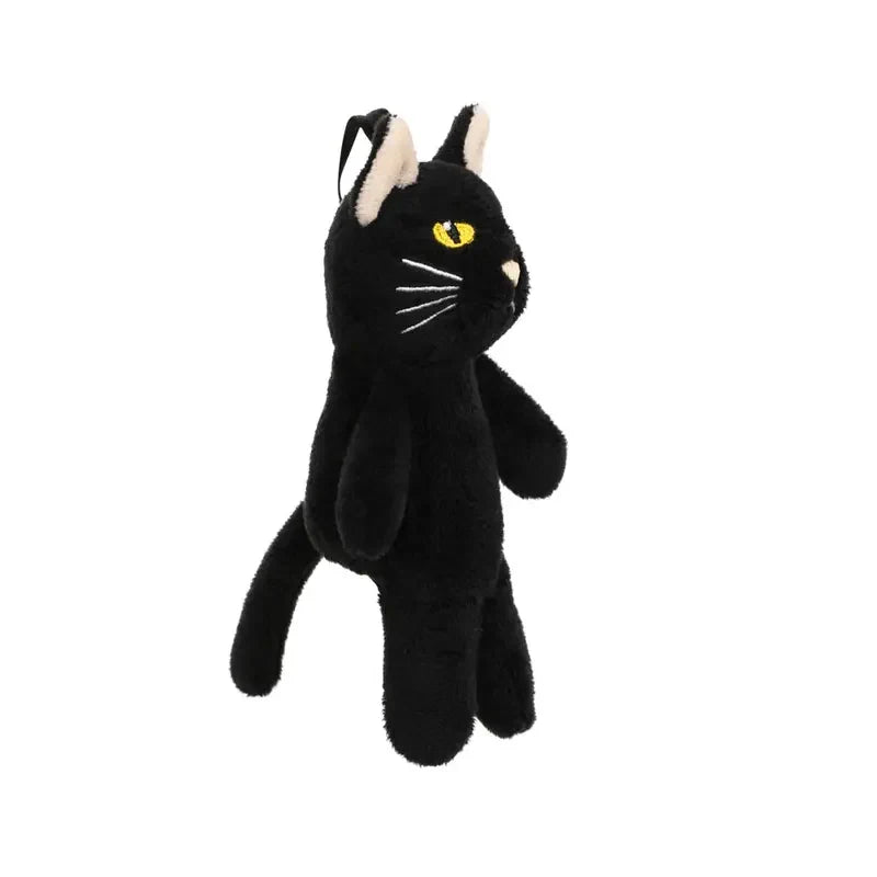 Introducing the Black Cat Finger Puppet Decoration—a plush toy featuring yellow eyes, white whiskers, and beige inner ears, standing upright against a white background. Perfect for imaginative play or as a charming addition to your Halloween decorations.
