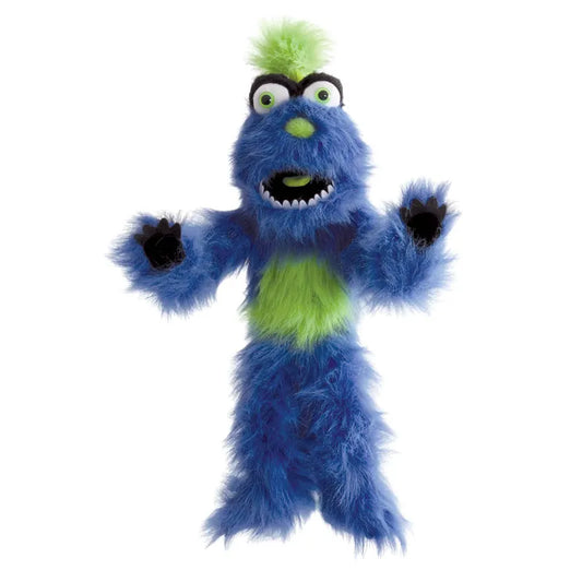 The Puppet Company Blue Monster puppet features a blue and green design with raised arms, bulging eyes, a wide mouth, tuft of yellow-green hair, and bold black eyebrows for an excited expression. It perfectly embodies quirky charm from the Puppet Company collection.