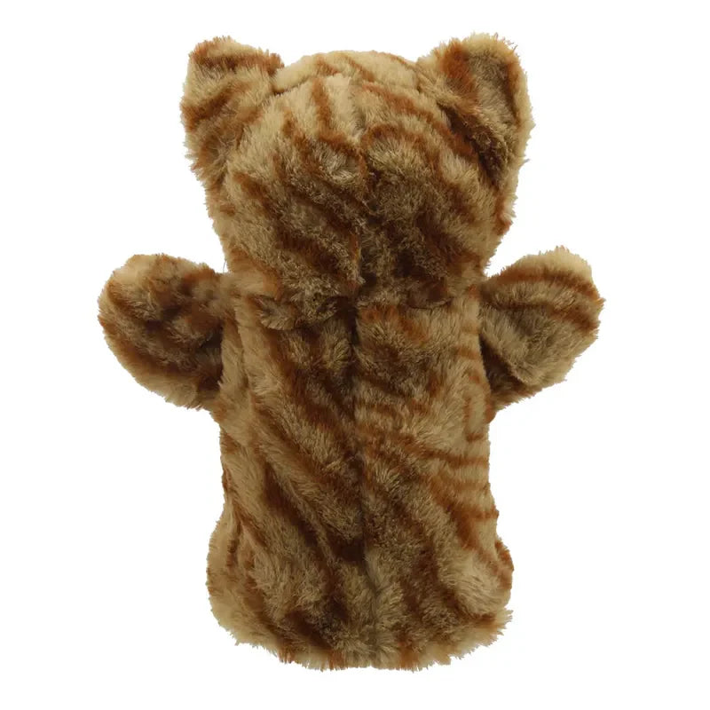 The ECO Puppet Buddies Cat Ginger Hand Puppet is shown from the back, featuring fluffy, tiger-striped fur made from recycled materials. It has light and dark brown stripes, two small rounded ears, and outstretched arms—perfect for imaginative play.