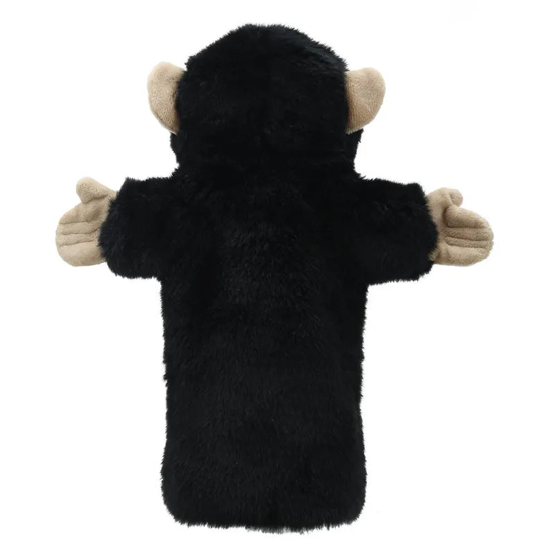 The Puppet Company Long Sleeved Puppet Chimp, featuring a black plush body with beige ears and hands and seen from behind, is ideal for imaginative play.