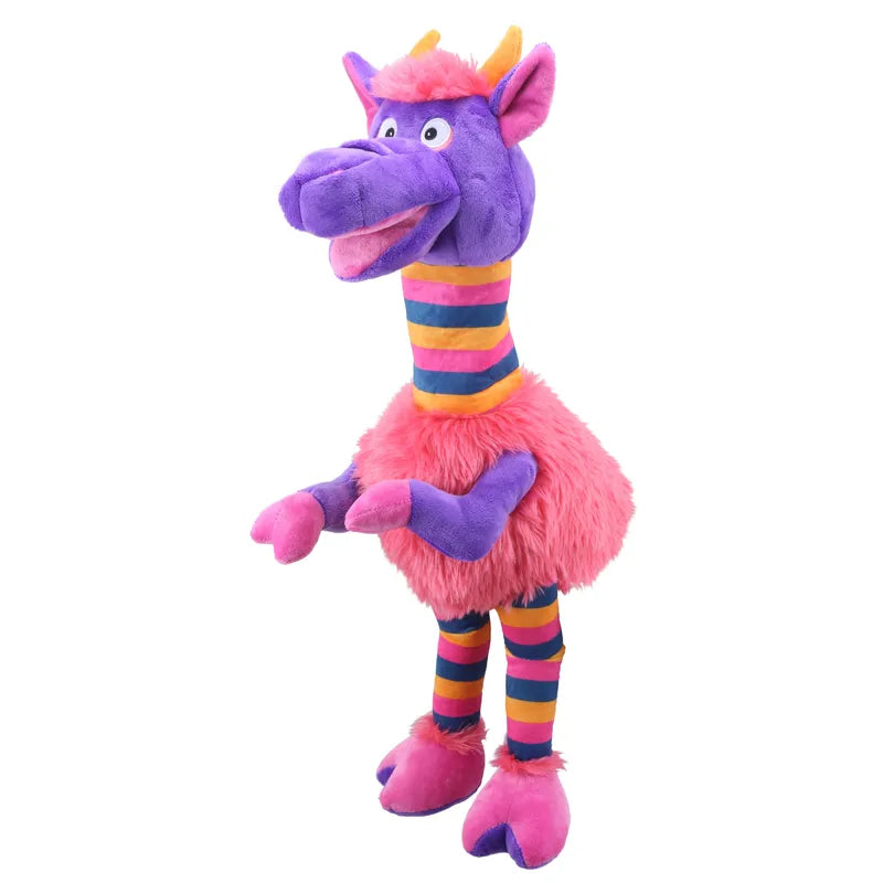 The Puppet Company Striders Cow Codswallop is a vibrant plush toy that can also be used as a hand puppet for creative play. It stands upright and features a purple head, neck, and limbs, complemented by a pink fluffy body. Adorned with striped bands in shades of orange, yellow, pink, and black on its neck and legs, this toy showcases a playful expression with wide eyes and a smiling mouth.