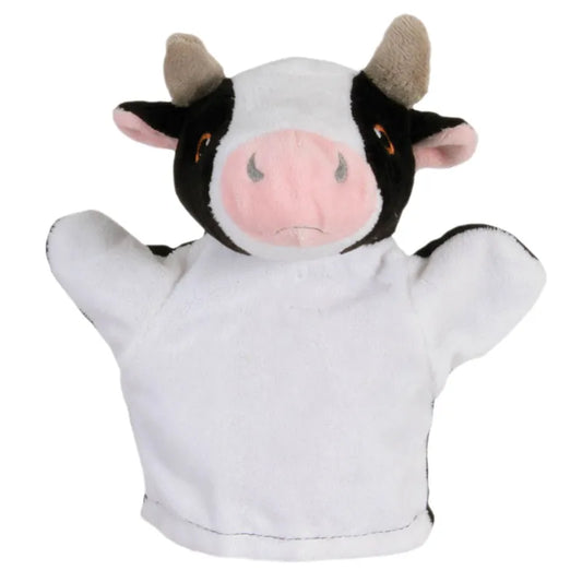 Introducing The Puppet Company My First Puppet Cow: a plush cow-shaped hand puppet with black and white spots, brown horns, pink snout, outstretched arms, and soft material—ideal for interactive play that enhances language development in young children.