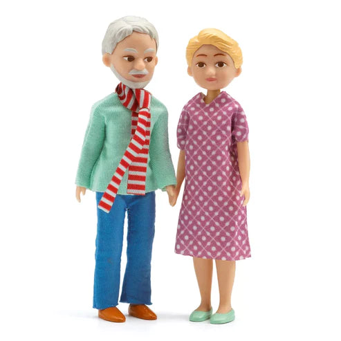 A couple of Djeco Dollhouse Accessory Grandparents standing next to each other, perfect for kids' puppet shows.