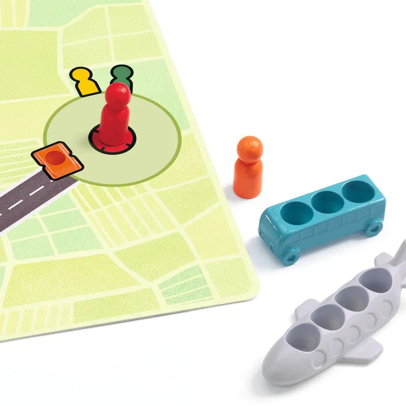 The Djeco Sologic Traffic Logic game involves colored pegs on a map, a toy car, and an airplane with passenger slots. Players use challenge cards to determine movement paths and strategize using logic in this increasingly difficult game. The road leads to a highlighted area where pegs mark key positions.