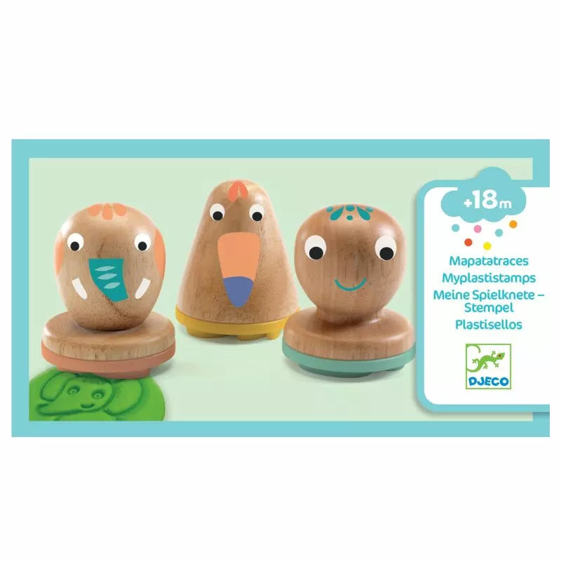 A group of three Djeco Myplastistamps sitting on top of a table.