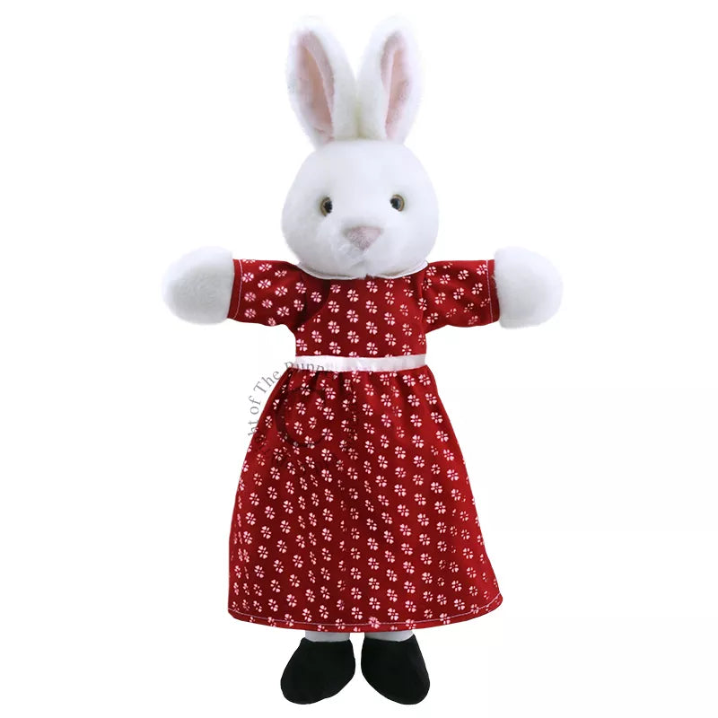 A kids' puppet show featuring a white Mrs Rabbit in a red dress.