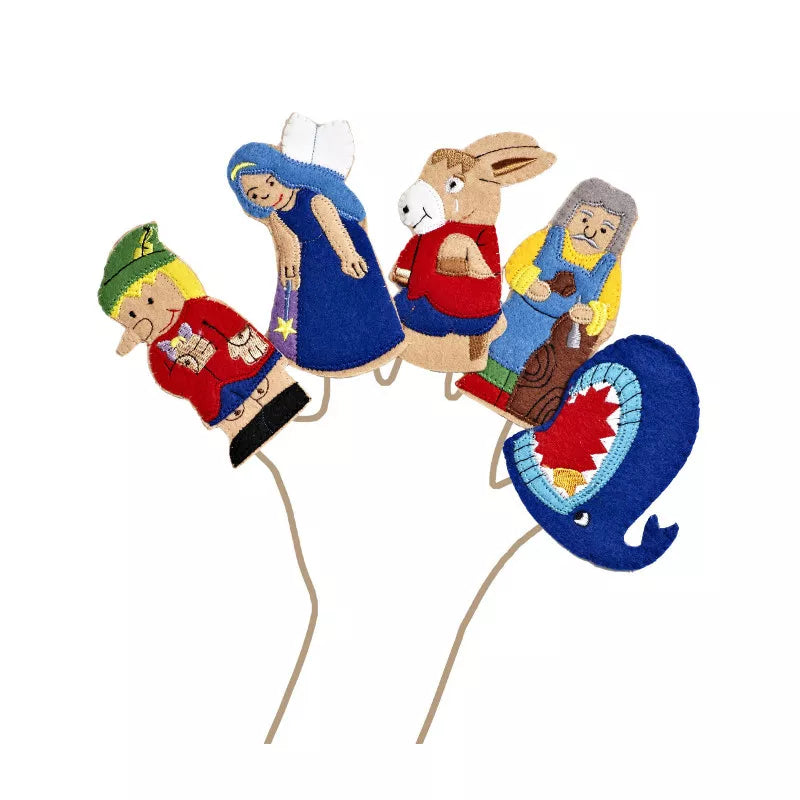 A set of Pinocchio Finger Puppets with a nativity scene.