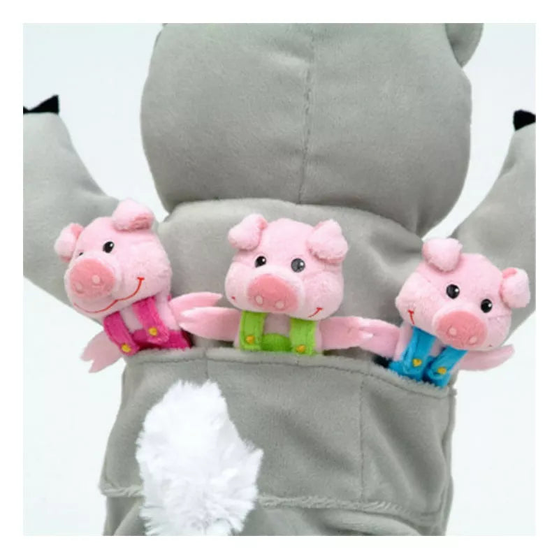 Three puppets, depicting the Big Bad Wolf and 3 Little Pigs, are stored in a gray jacket for an upcoming kids' puppet show.