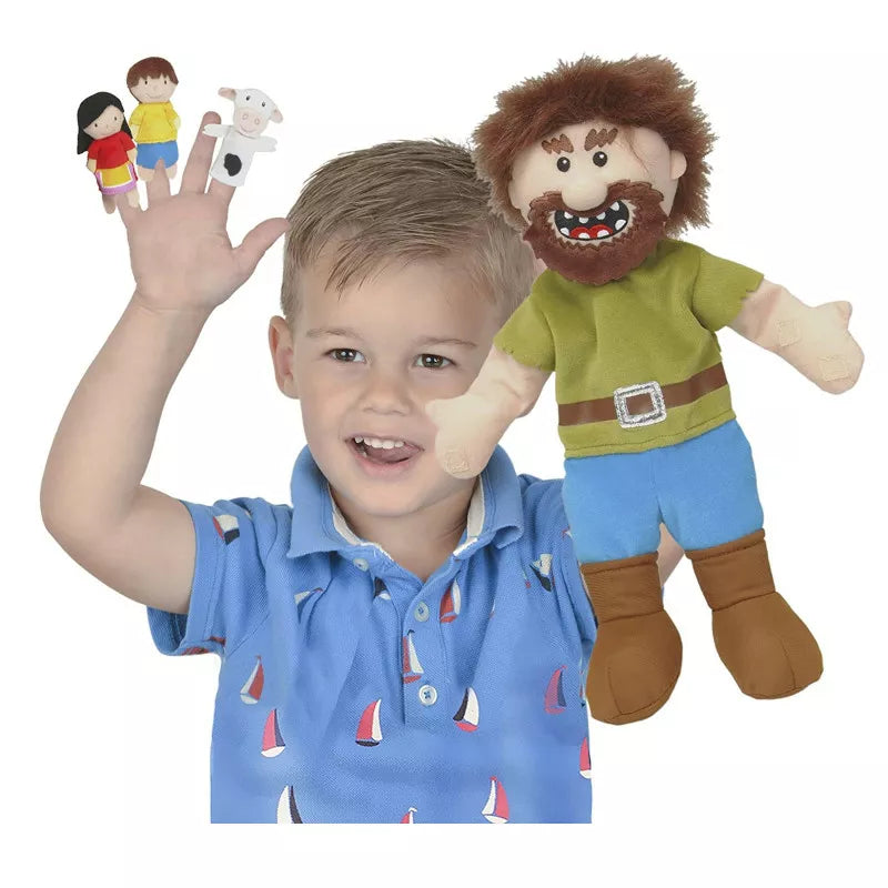 A young boy is engaging in a puppet show with a Fiesta Crafts Jack & The Beanstalk Puppet Set.