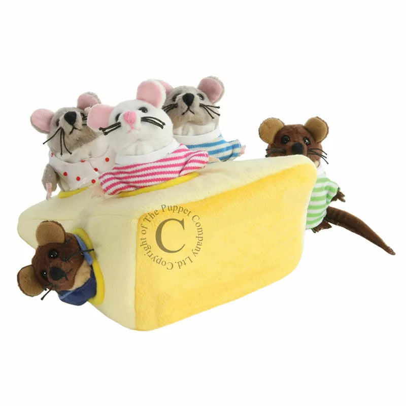 Four Hide Away Mouse Family performing in a kids puppet show, sitting on top of a piece of cheese.