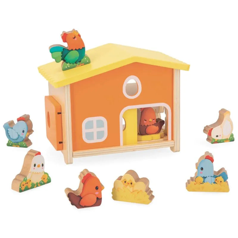 The Janod Farm - My First Chicken Coop features a vibrant wooden design with a yellow roof, orange walls, and white windows, plus chicken, chick, and rooster figurines—ideal for toddlers' imaginative early learning play.