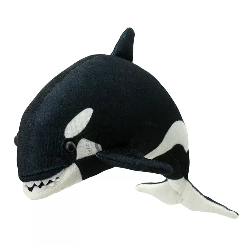 The Puppet Company Whale Orca Finger Puppet for kids at a puppet show.