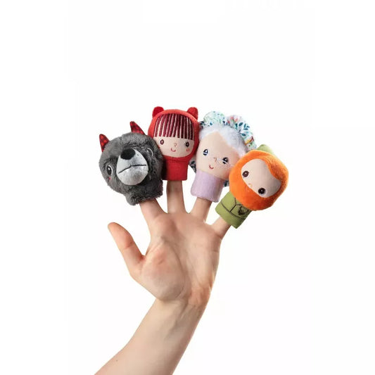 A hand playfully displaying a colorful assortment of Lilliputiens Little Red Riding Hood Finger Puppets, each with a unique character design.