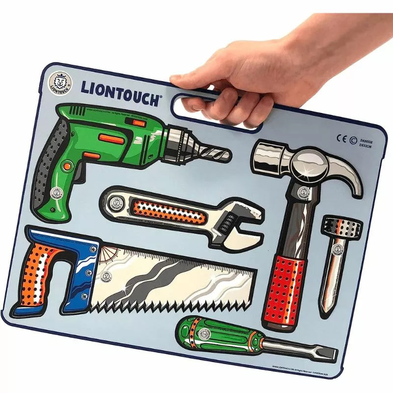 A hand holding a Liontouch Tool Play Set, perfect for puppet shows and imaginative play.
