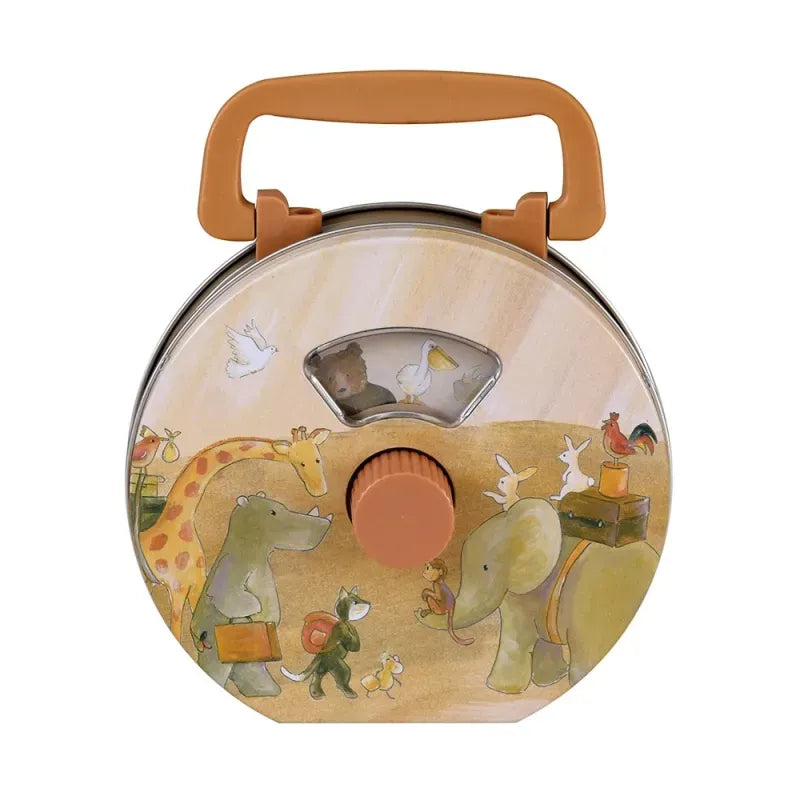 The Musical Radio Noah's Ark is a round, tan lunchbox with a brown handle and knob, decorated with animal illustrations—including an elephant, giraffe, hippo, birds, dog, and cat—evoking the charm of a classic tin toy.