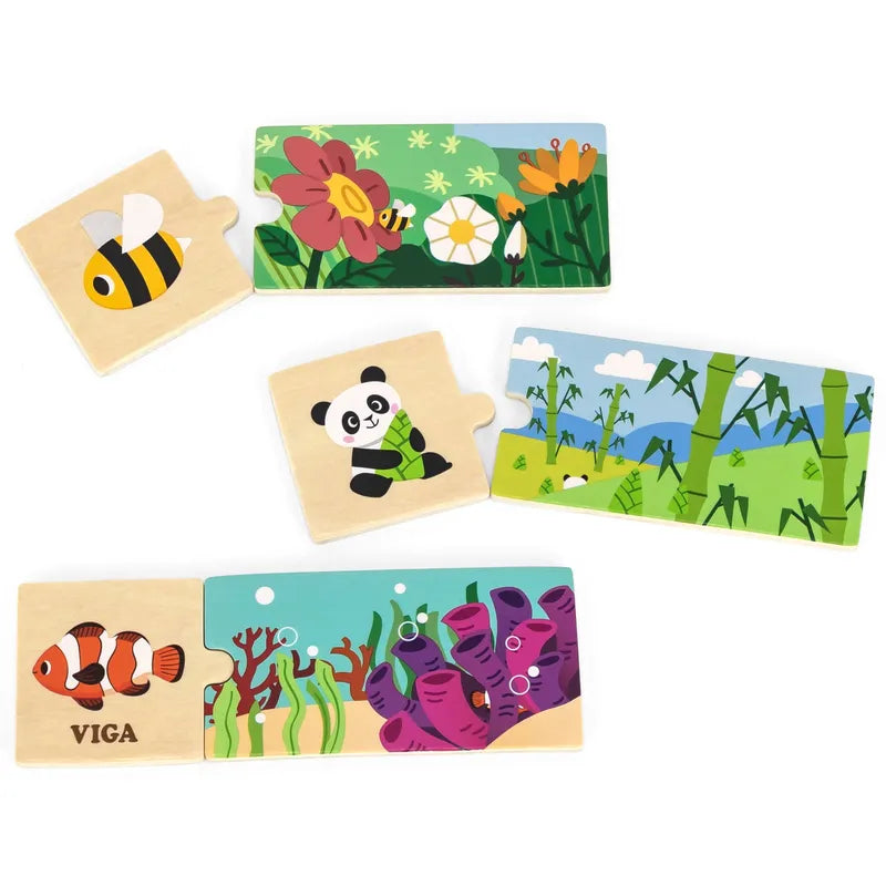 The My Home Puzzle Set consists of colorful wooden jigsaw puzzle pieces showcasing imaginative scenes: a bee near flowers, a panda in a bamboo forest, and a clownfish swimming among coral. Each piece is specifically designed for children to enhance learning with vibrant illustrations and can be neatly stored in a magnetic flip box.