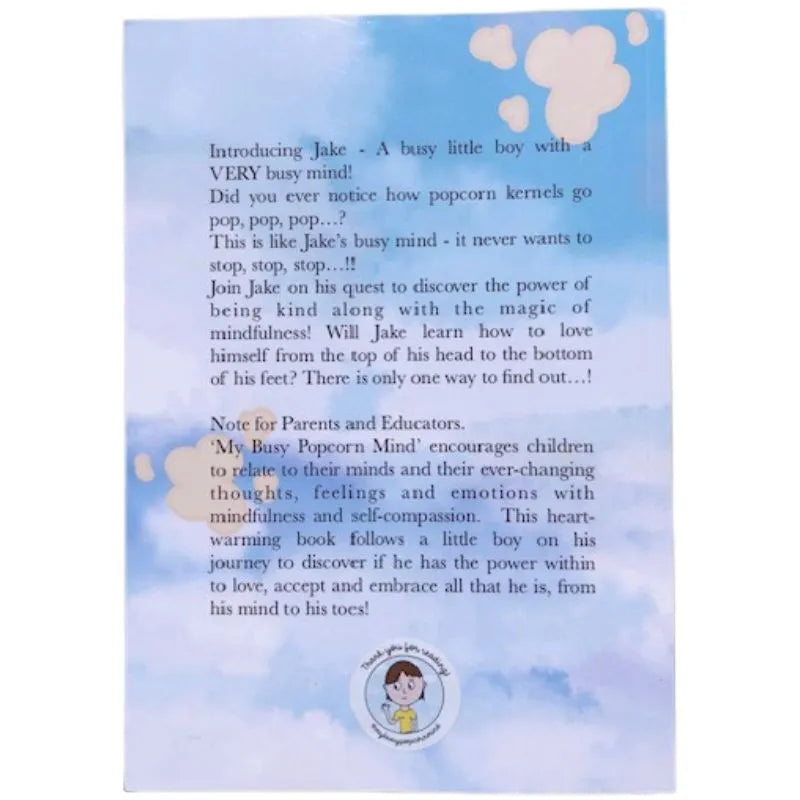 An illustration of the back cover of a children's book titled "My Busy Popcorn Mind" describes the story of a boy named Jake who learns about mindfulness and self-compassion. The background is a light blue sky with cartoon clouds, and there is a small cartoon of Jake at the bottom.