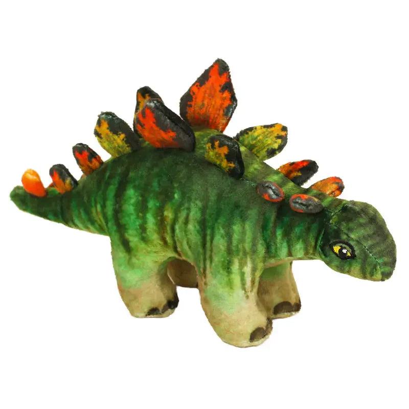 The Natural History Museum Small Stegosaurus Soft Toy is a green plush dinosaur with orange and black plates, four legs, and a friendly face—ideal for young explorers or fans of the museum.