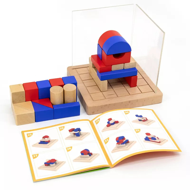 The 3D Block Building Game, with red, blue, and beige blocks on a wooden base, includes an instruction booklet with building examples. This setup, complete with a clear divider and cylindrical blocks, is designed to enhance spatial awareness and problem-solving skills.