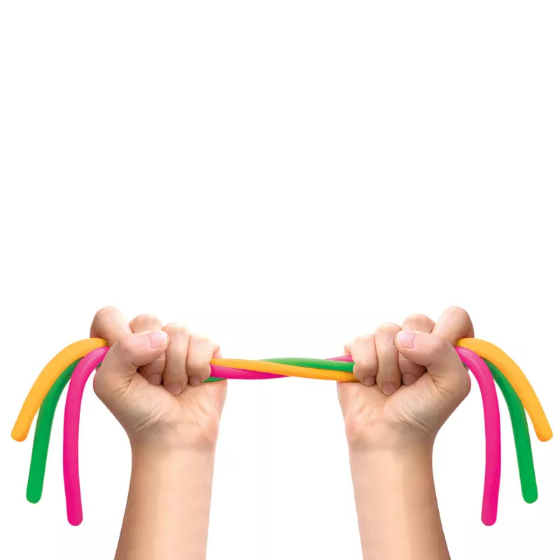 Two hands stretching Schylling’s Noodlies Needoh, colorful bendy tubes against a white background, demonstrating flexibility or elasticity as an anxiety reliever.