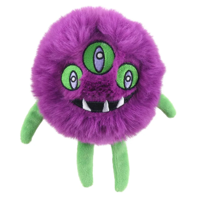 The Orbix Micro Monster Finger Puppet by The Puppet Company is a plush, furry purple creature with three green eyes, a wide smiling mouth with white fangs, and four green legs—perfect as a cuddly toy.