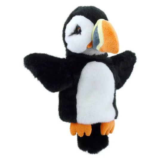 The Puppet Company CarPets Puffin, featuring black and white fur with a vibrant orange beak and feet, is perfect for imaginative play. Its soft, cuddly design and outstretched wings make it ideal for sparking nature conversations against a crisp white backdrop.