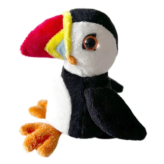 The Puppet Company Puffin Finger Puppet is a plush toy featuring a black and white body, colorful beak with red, yellow, blue sections, and orange feet. This puppet sits upright against a white background, perfect for imaginative storytelling adventures.