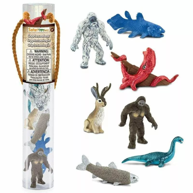 A TOOB® with a variety of animals and fish in it.