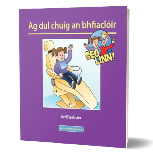The image shows a children's book titled "Seo linn! – Scéalta Sóisialta Ag dul chuig an bhfiaclóir" by Avril Webster. Perfect for language development, the cover is purple and features an illustration of a child sitting in a dentist's chair with a smiling dentist and assistant nearby, reflecting its Irish roots.