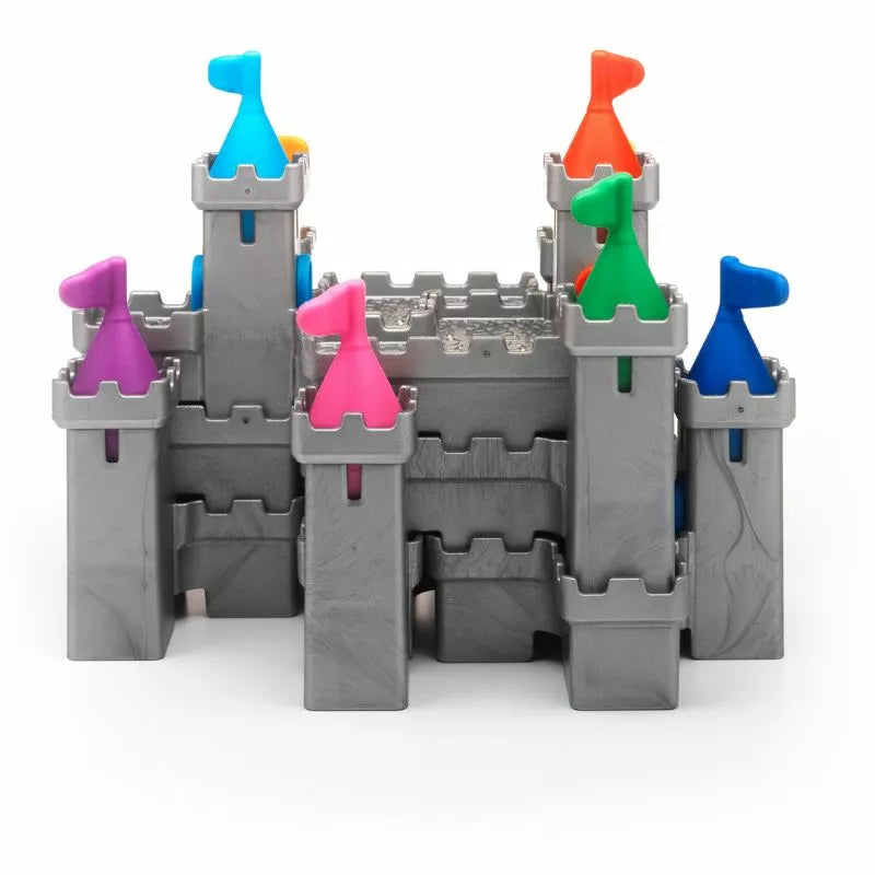 The SmartGames Tower Stacks is a vertical gray plastic castle toy with colorful flags in red, orange, blue, green, and purple on its towers. Its whimsical structure features multiple battlements and a central keep, offering a perfect brain teaser for adventurous young minds.